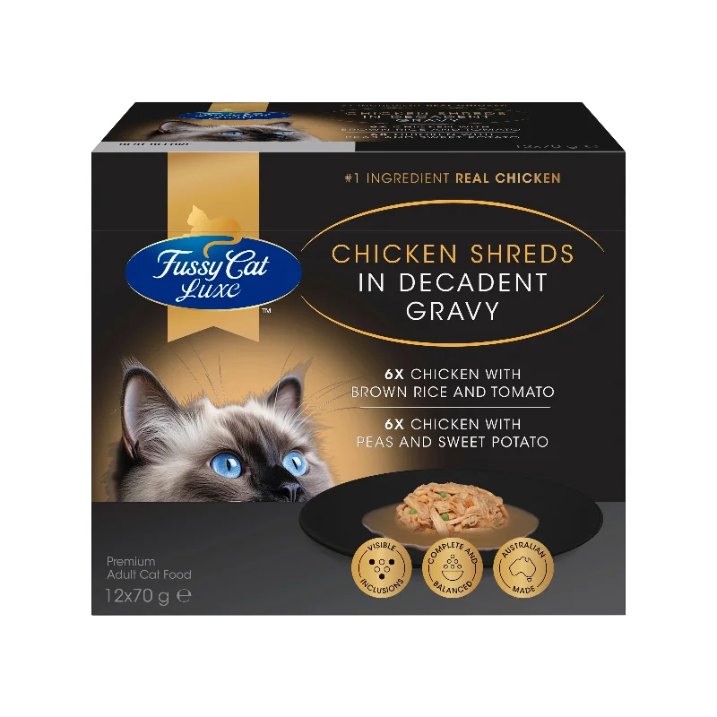    - Fish-based cat food  Fussy Cat Luxe Chicken Shreds in Decadent Gravy 12x70g